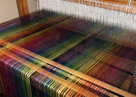 The Weaver's Dilemma: Symbolic Threads and the Tapestry of Existence?